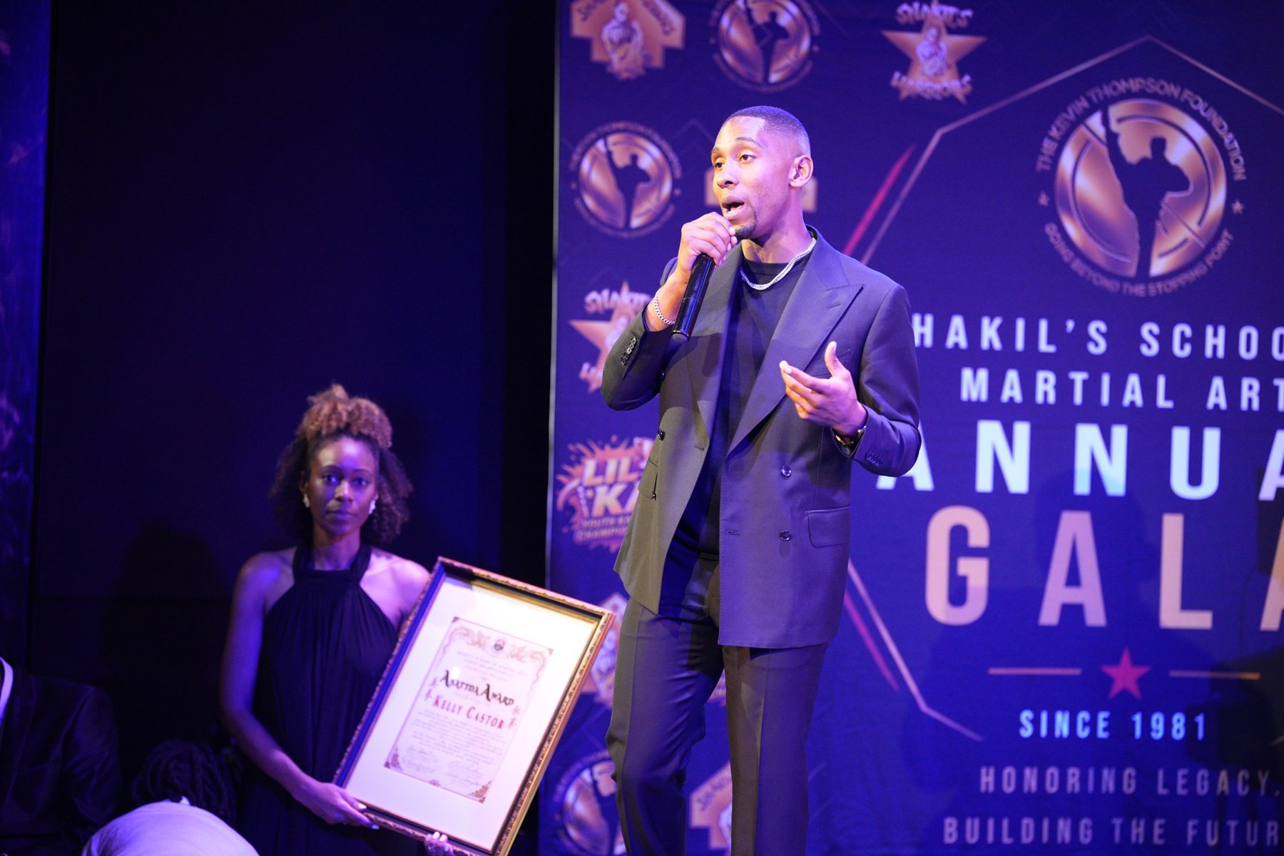 On the mic at the Founder's Gala